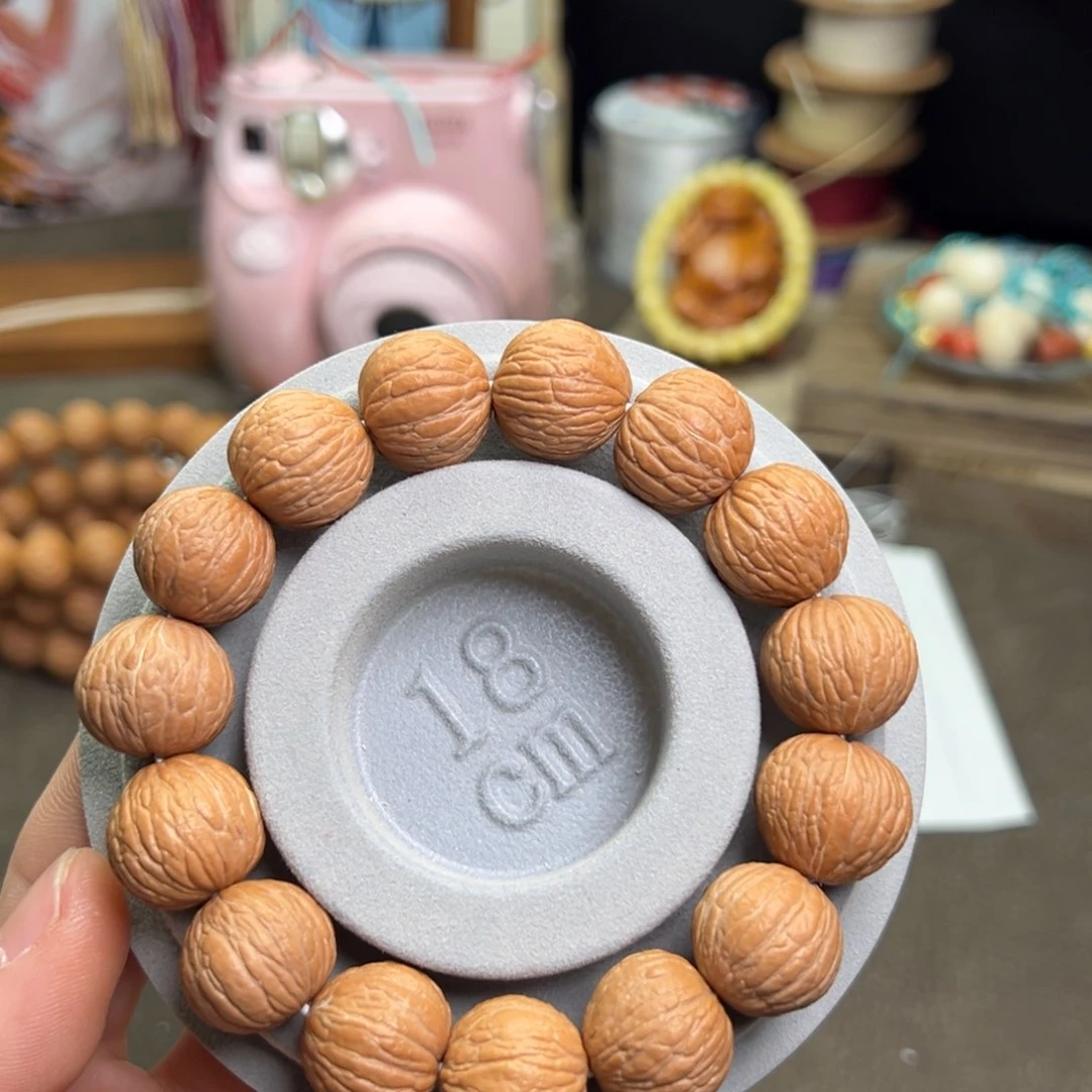 猴头核桃吊坠猴头凤羽原皮原色手串