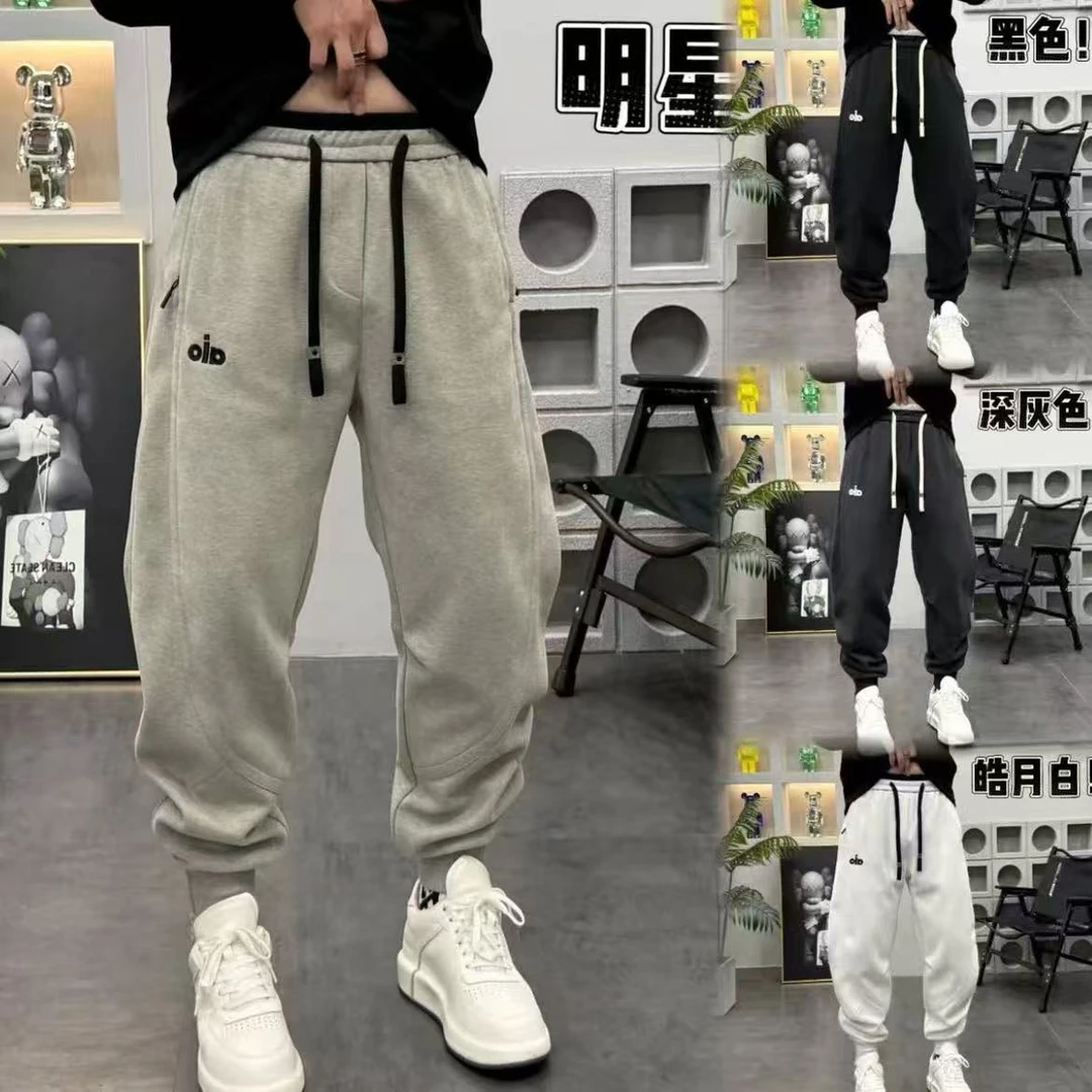 秋季男士潮流时尚刺绣拼接立体裁剪弯刀束脚卫裤松紧腰宽松休闲裤