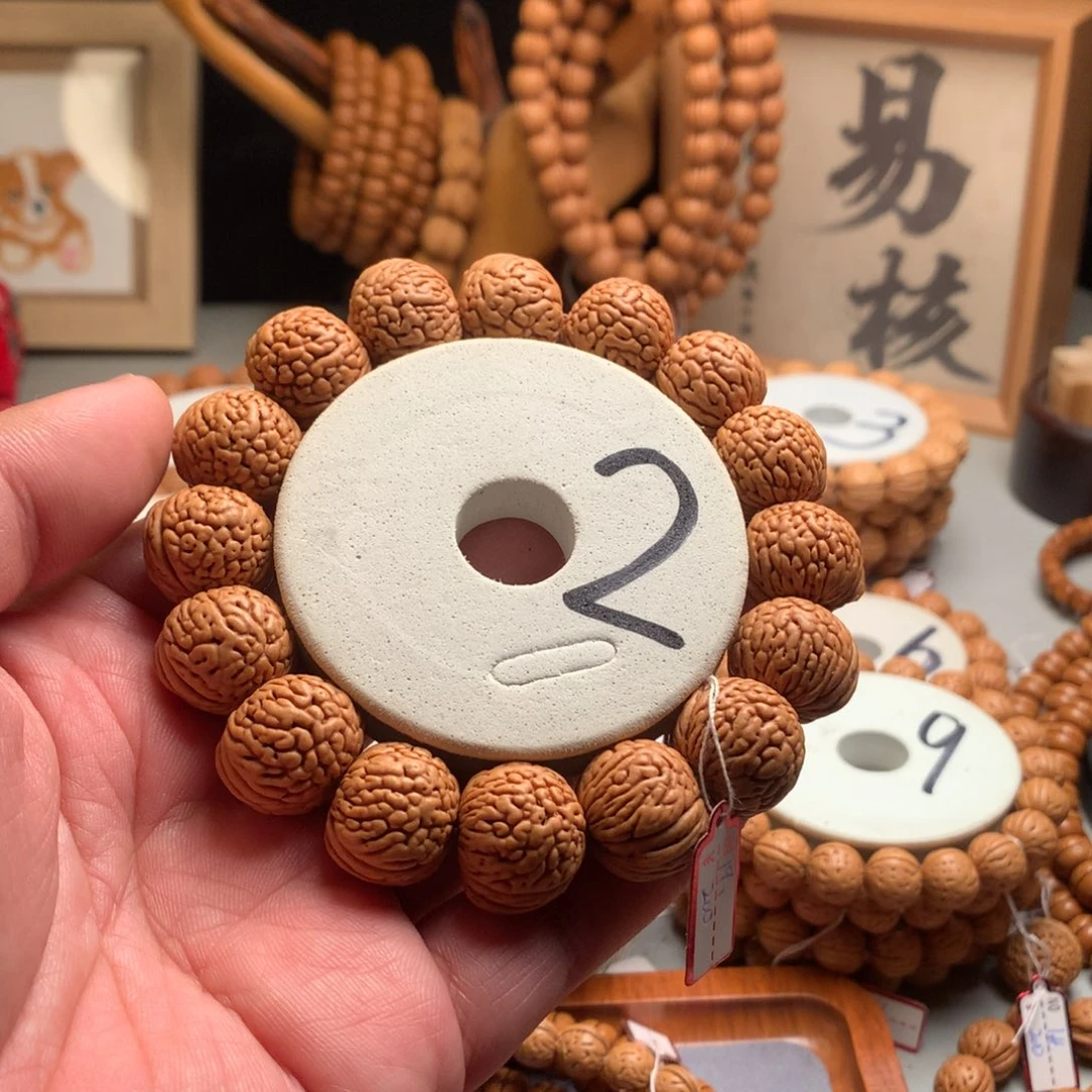 1***手桃核手串1.9雨花石桃核手串