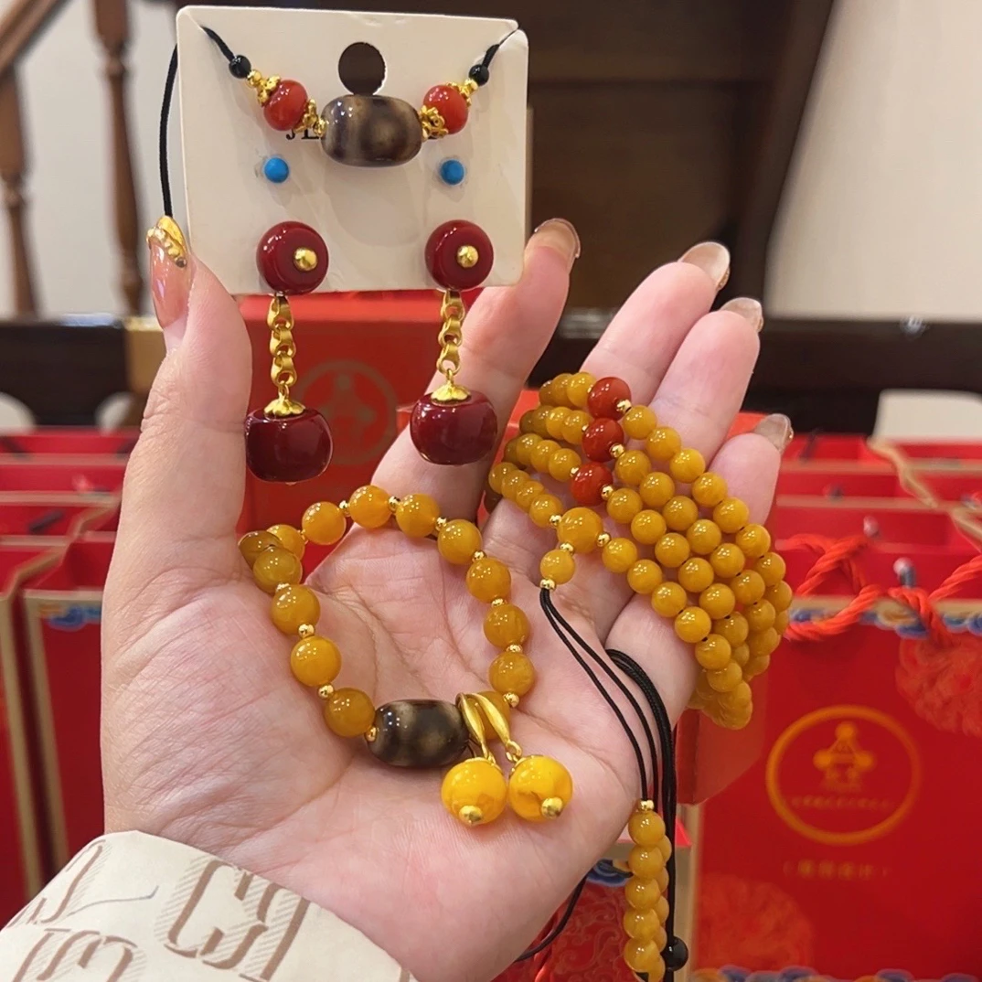 铜合金亚克力项链  （松赞饰品店）郯城吉祥纹加幸运珠，数量加到六！