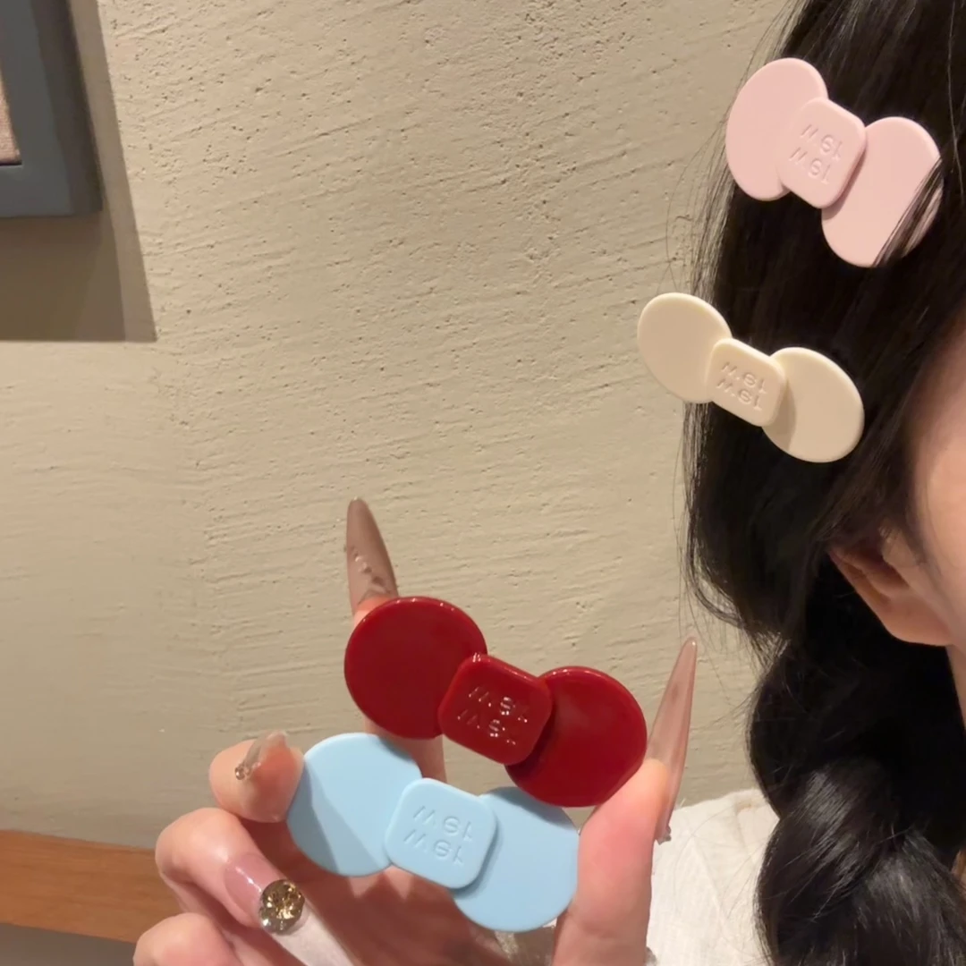 明星同款可爱蝴蝶结鸭嘴夹彩色亚克力侧边碎发夹子2025新款发饰女