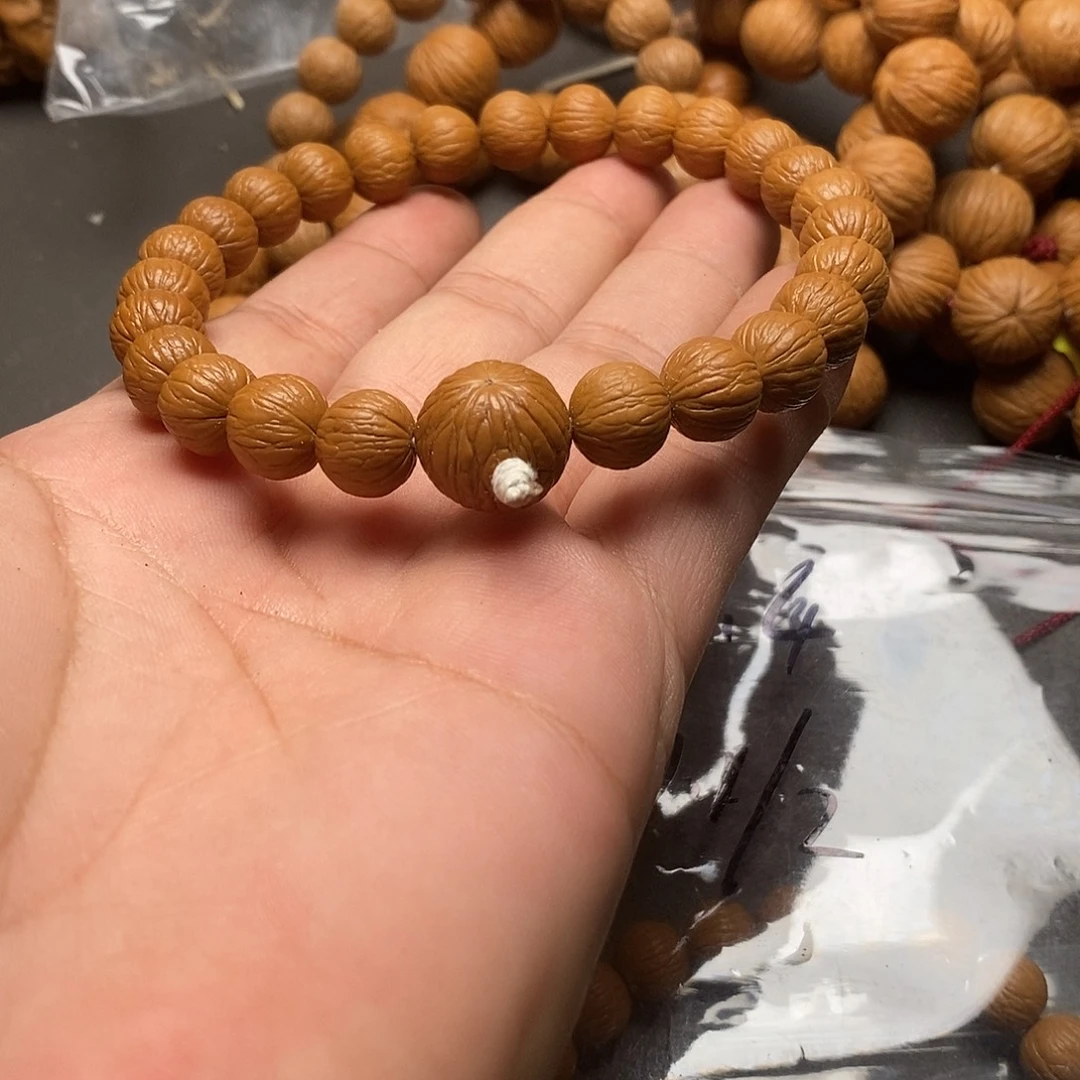 玖***壹猴头核桃吊坠凤羽