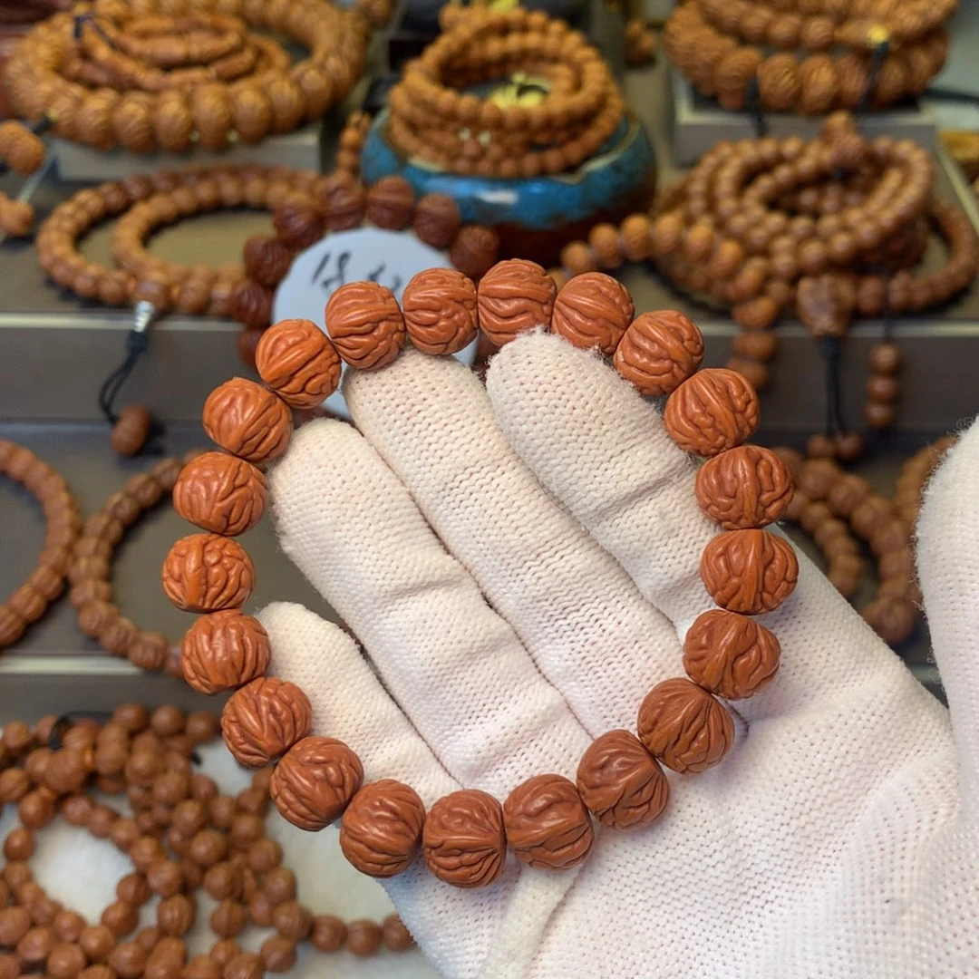 不***儿手串桃核秦岭龙纹