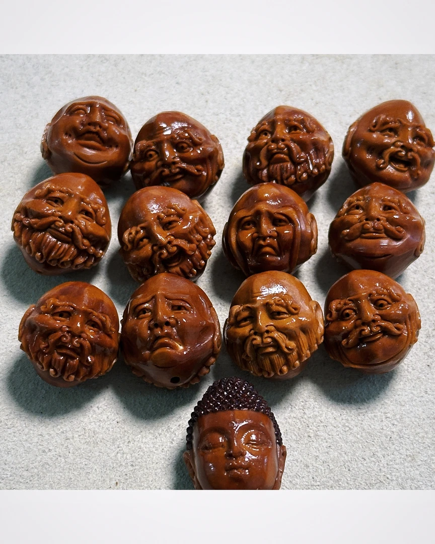 橄榄核雕双面罗汉单籽
