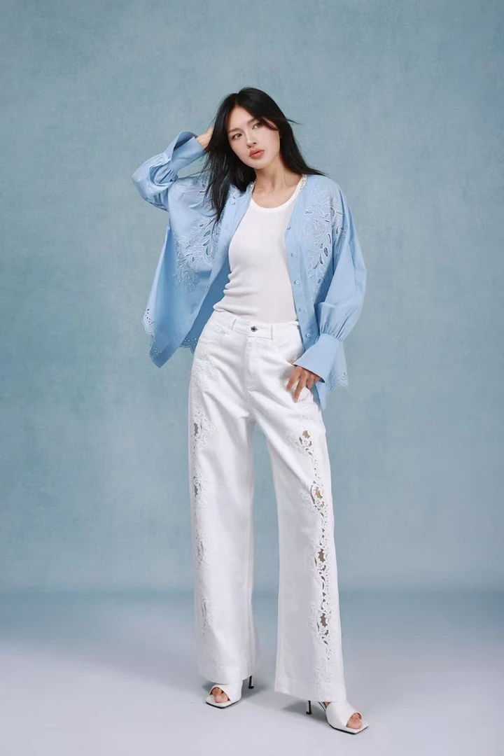 玛丝恩迪新款镂空造型款白色牛仔裤