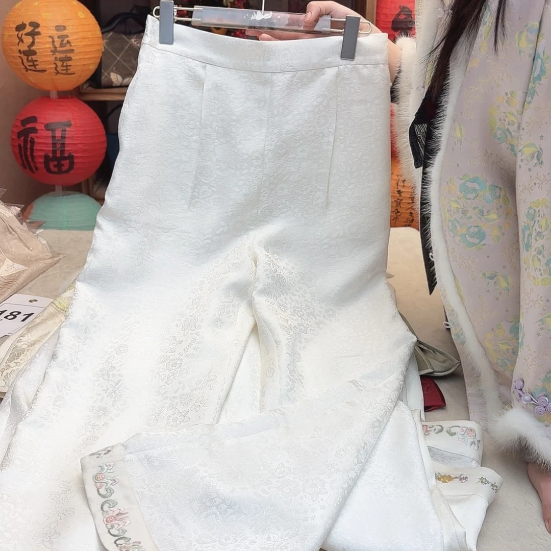 刺绣花**墨100裤长，72腰围
