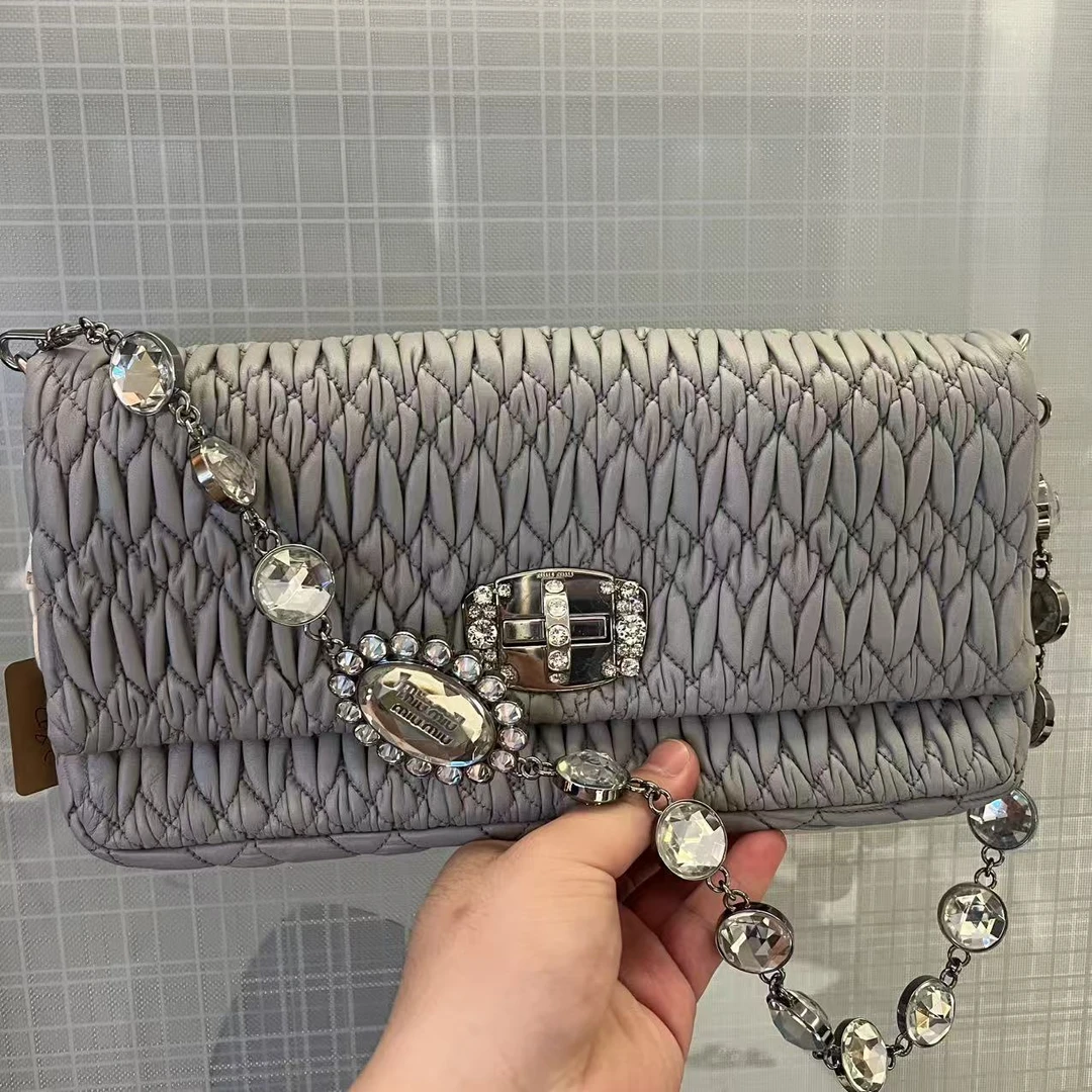 95新 MIU MIU/缪缪 银色手提斜挎包