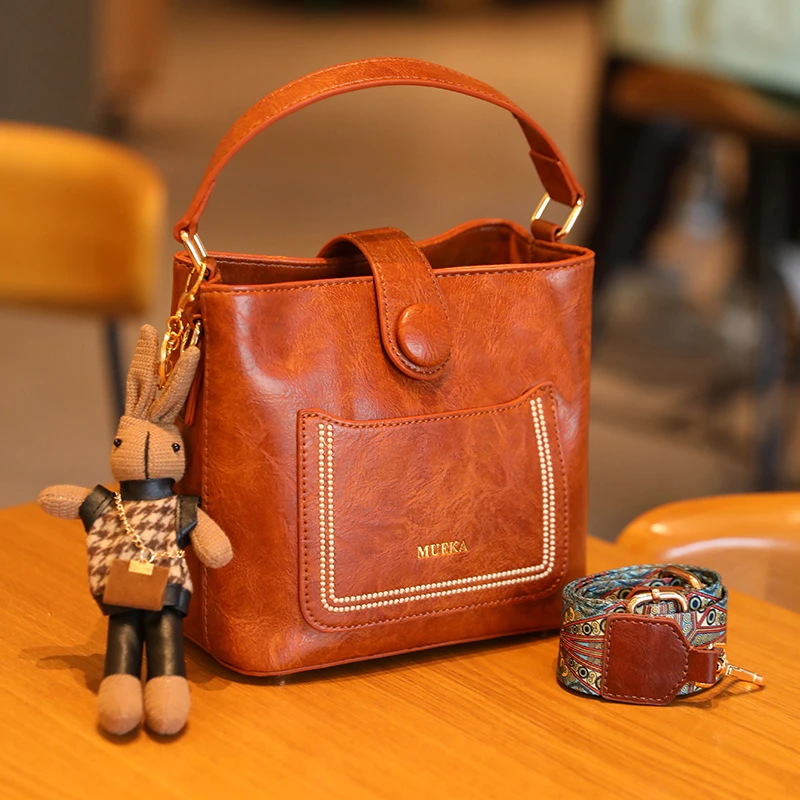 【MUEKA/茉妮卡】品牌休闲复古水桶包女百搭单肩包2025新款斜挎包女