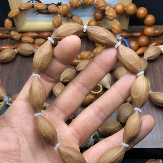 车***丁吊坠橄榄核，ace哦哦哦