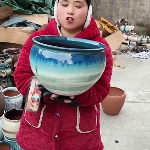 30口21高瑕疵口裂盆子。