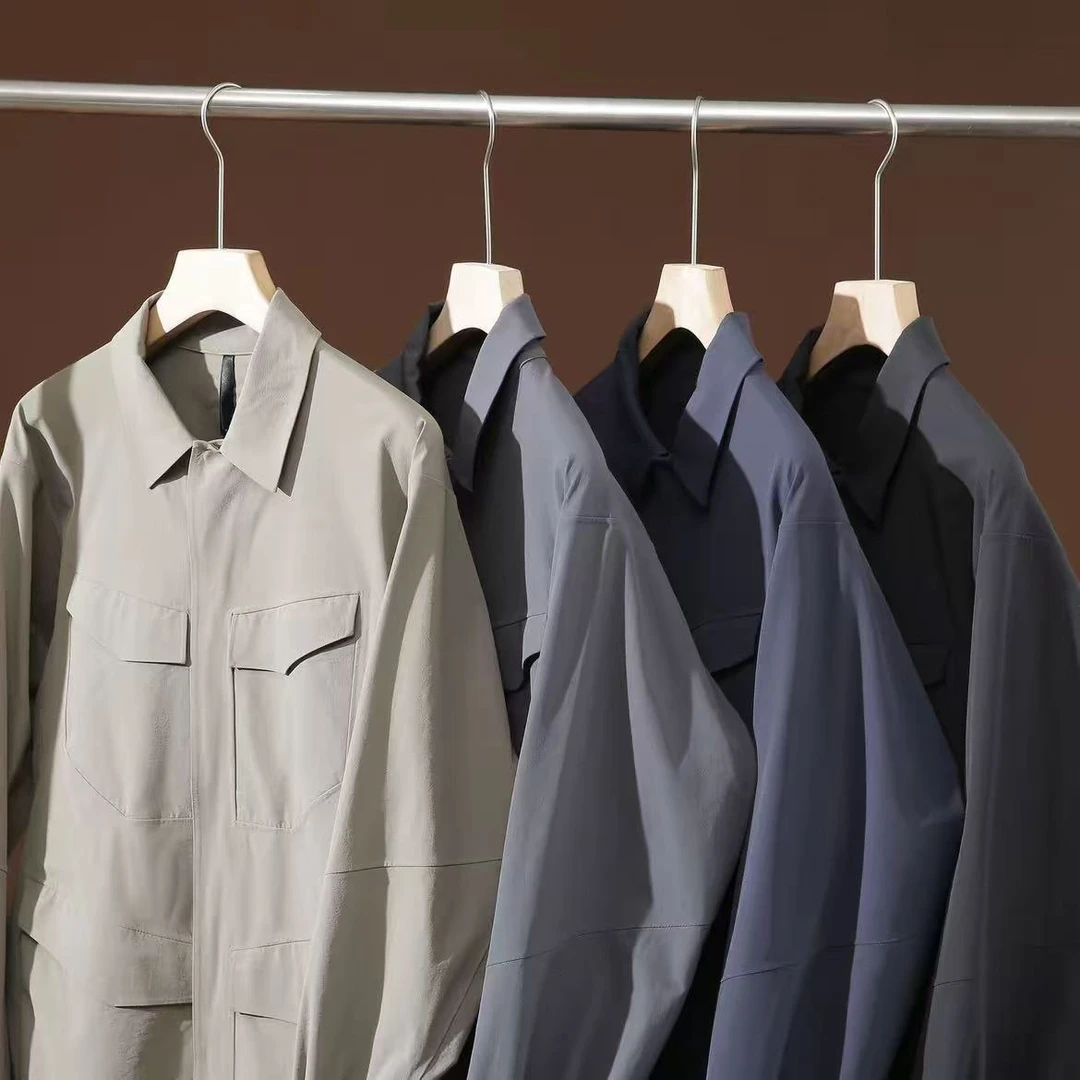 50d四面弹线缝压胶防泼水 男士立挺城市户外休闲夹克外套