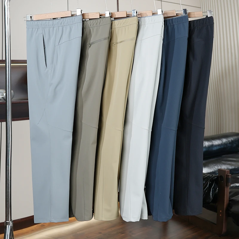 男士户外秋冬季新款三防软壳弹力直筒长裤防风登山运动裤休闲裤