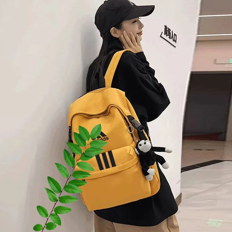 2025年情侣男女双肩包款户外休闲运动书包背包黄色663