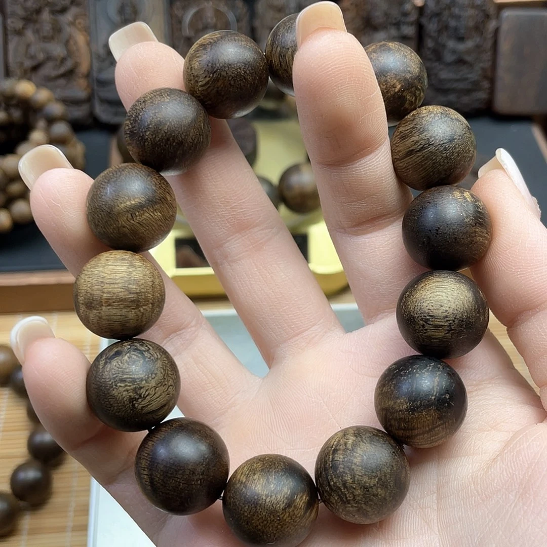 沉香手串老**画达拉干