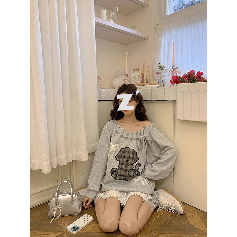 设计感小众露肩宽松卫衣女春季小狗蝴蝶结刺绣一字肩休闲长袖上衣