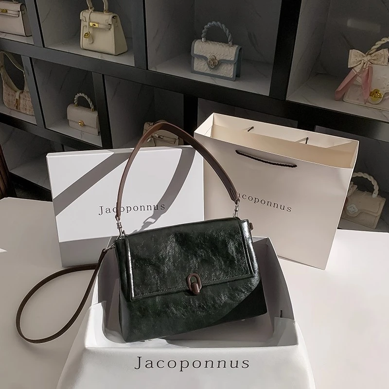 【设计师款】真皮墨绿邮差包女2025新款轻奢小众高级感百搭托特包