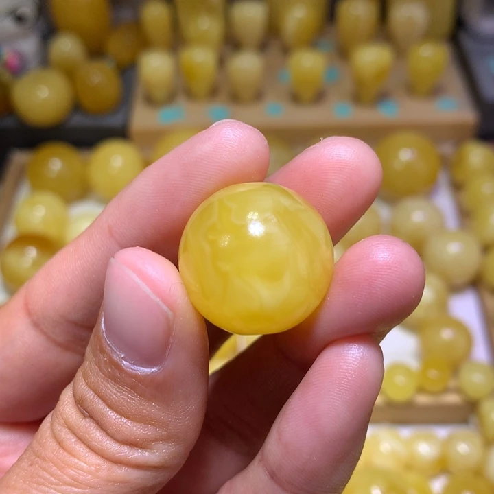 蜜蜡裸石未镶嵌尚**伟天然俄料鸡油黄溶洞妖花圆珠21.1