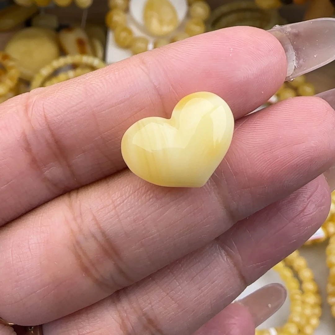 蜜蜡未镶嵌裸石白花屁桃打孔不退换