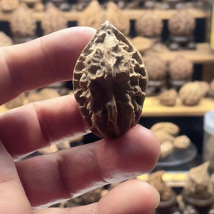 文玩核桃把件双面鬼脸