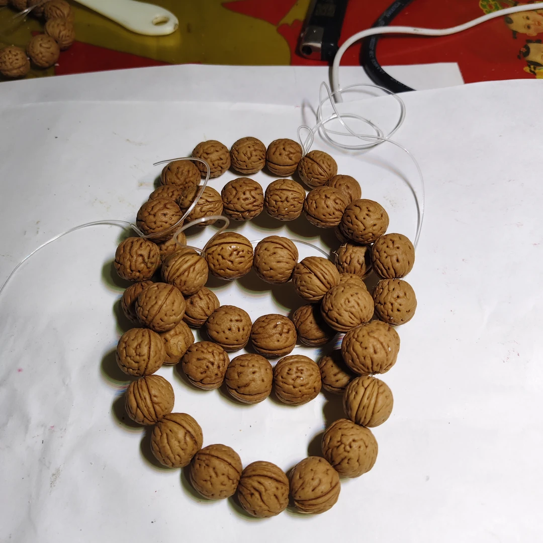 手把件可盘玩桃核手串