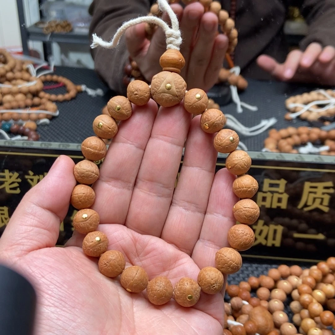 凤眼菩提吊坠12.5铜钉手串