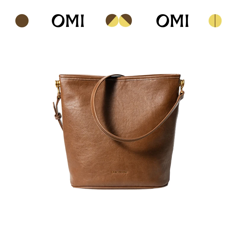 OMI/欧米单肩斜挎包复古植鞣牛皮托特包水桶包韩版简约潮流