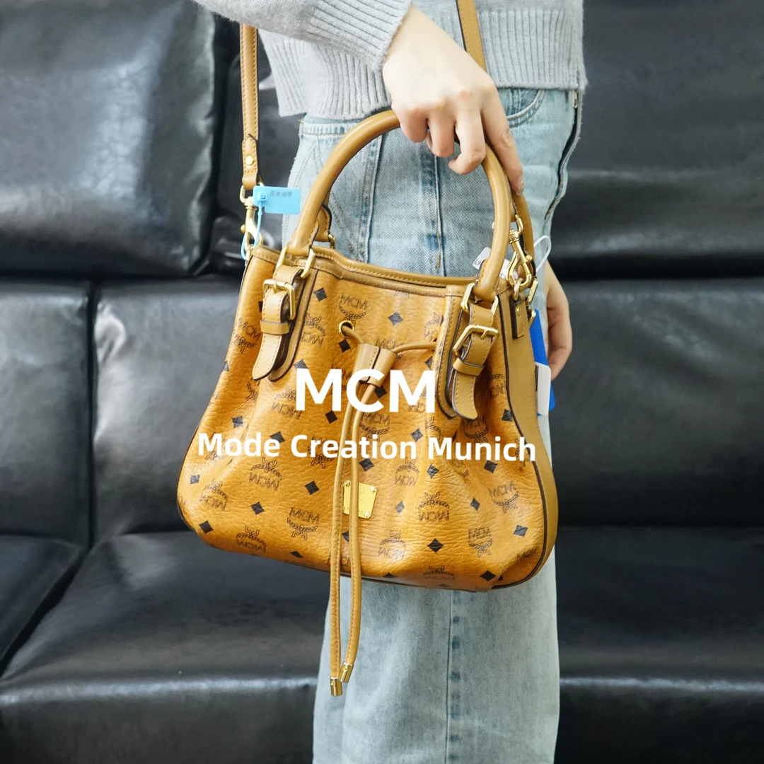 95新 MCM 干邑色抽绳斜挎包/KH01616067/6067