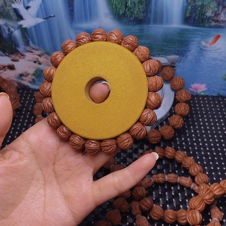 桃核吊坠听**雨龙纹桃核