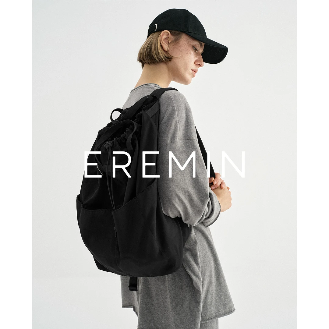 Min 男女款轻便功能性大容量抽绳双肩包55619