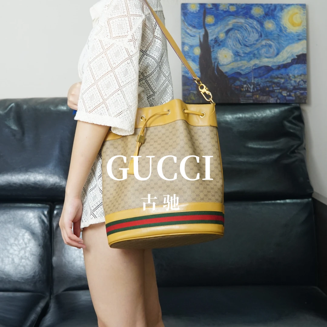 95新 GUCCI/古驰 老花抽绳水桶斜挎包/AB05319008/9008