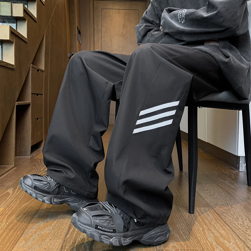 2025新款男春秋休闲运动青少年工装伞兵裤宽松条纹情侣直筒卫裤男