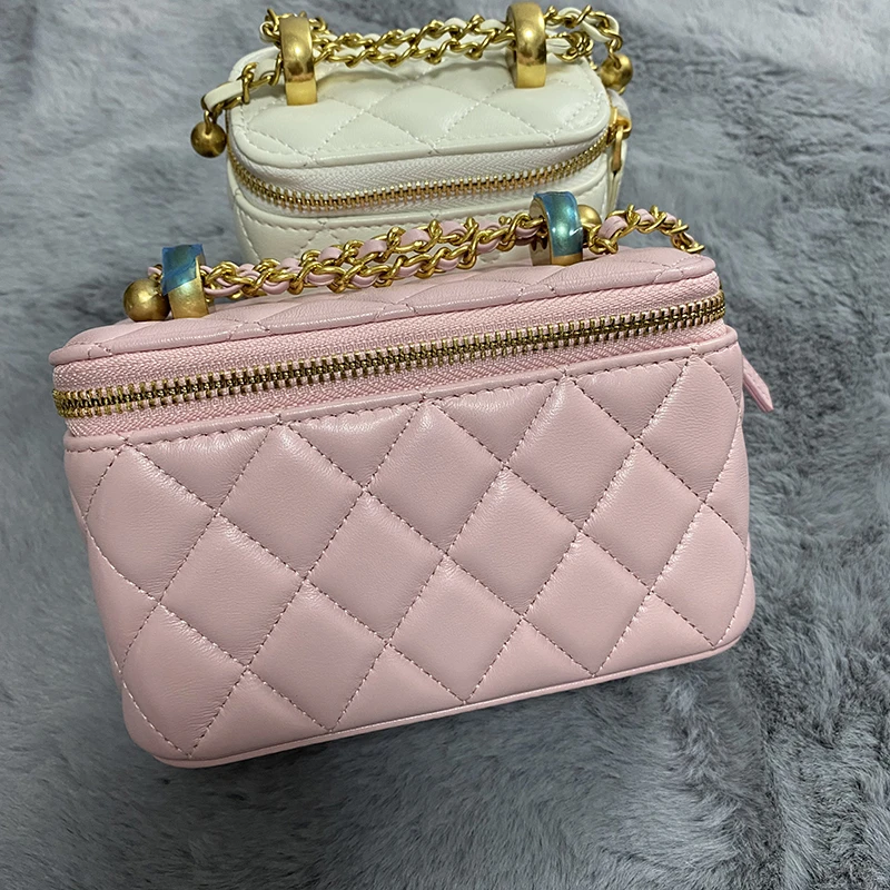 特价空白版盒子包进口小羊皮粉色手机包化妆包16厘米不退换