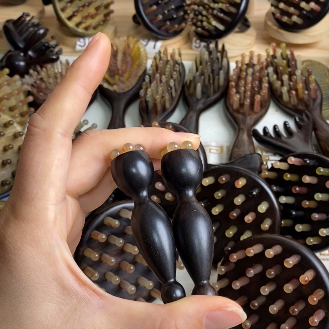 瑕疵紫光檀按摩梳子