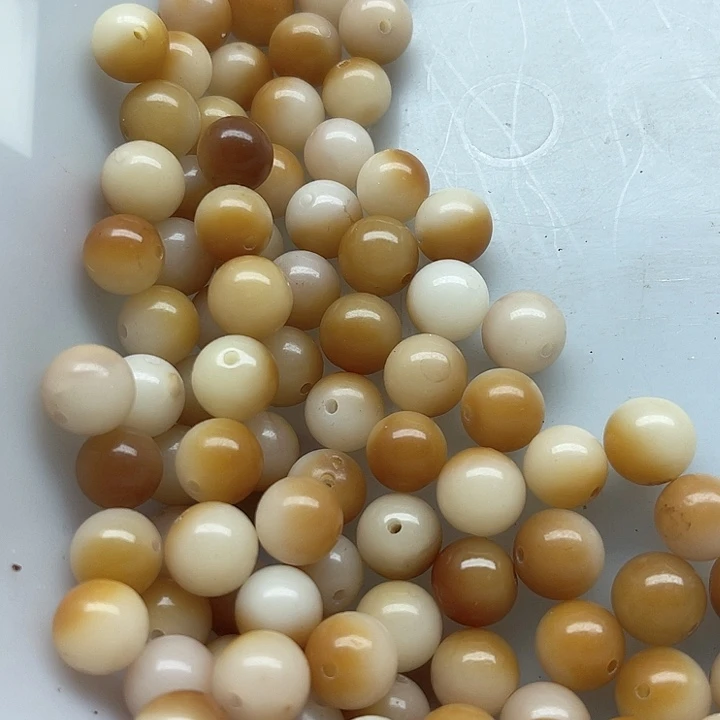 白玉菩提吊坠瑕疵10炭烤圆珠110