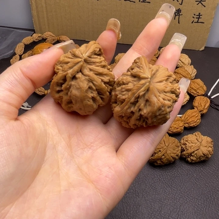 零****桃核吊坠南疆角单只异型有瑕有黄