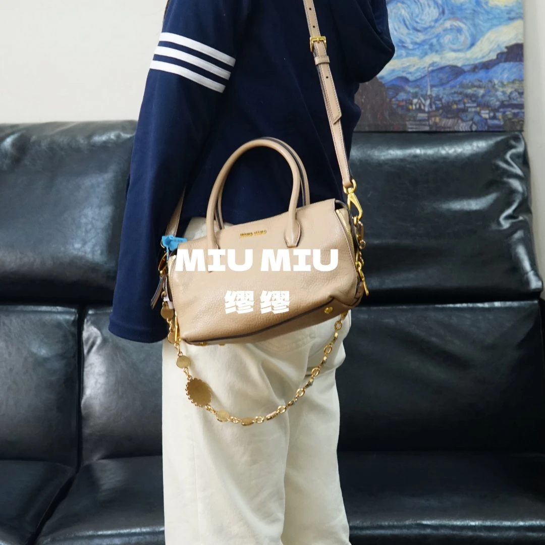 95新 MIU MIU/缪缪 miumiu/粉色斜挎包/HD01706034/6034