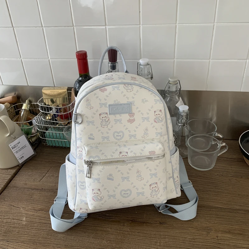 可爱小猫双肩包包大容量学生上课背包蝴蝶结手提包百搭蓝色少女包
