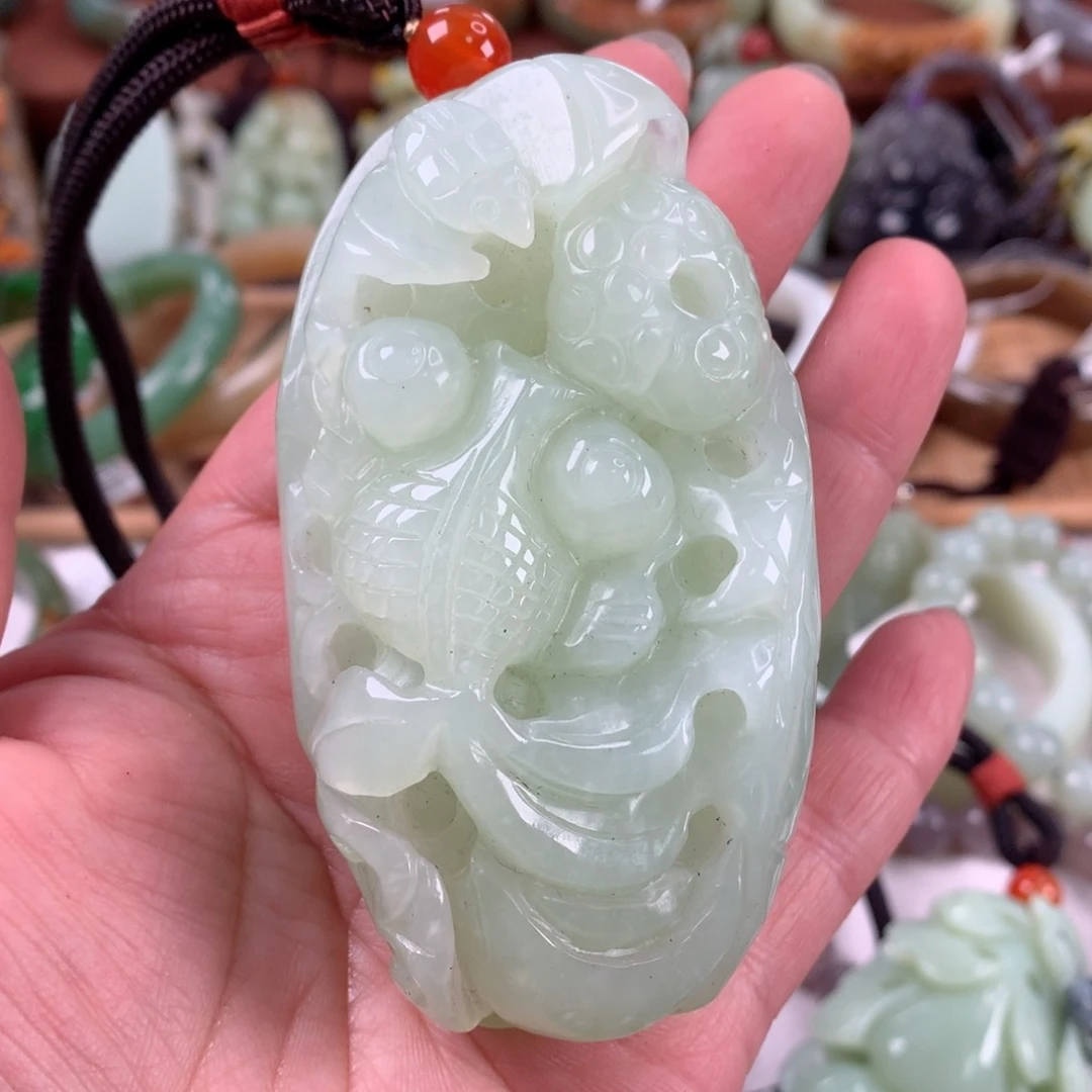 岫玉手把未镶嵌金鱼