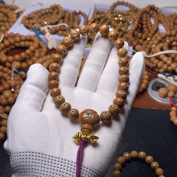 心***简尼泊尔凤眼菩提手串