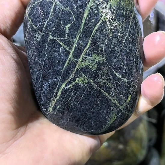 汤***圆有机玻璃藏玉药王石原石一个
