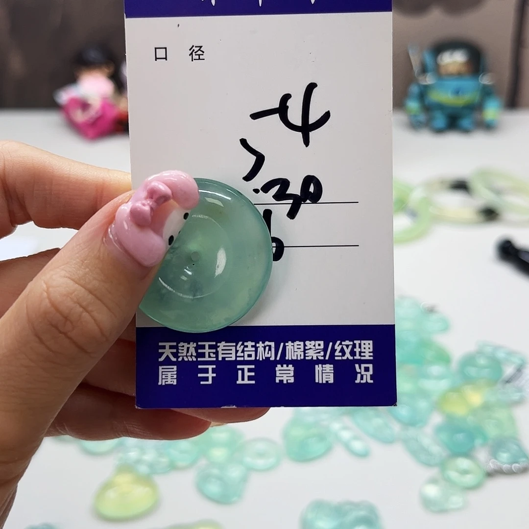 柒***。蛇纹石玉未镶嵌吊坠