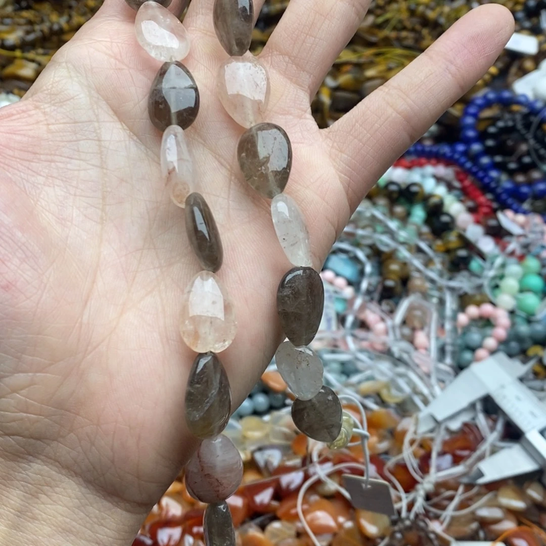 玛瑙/玉髓未镶嵌珠宝半成品一条有瑕胶花茶晶水滴天然