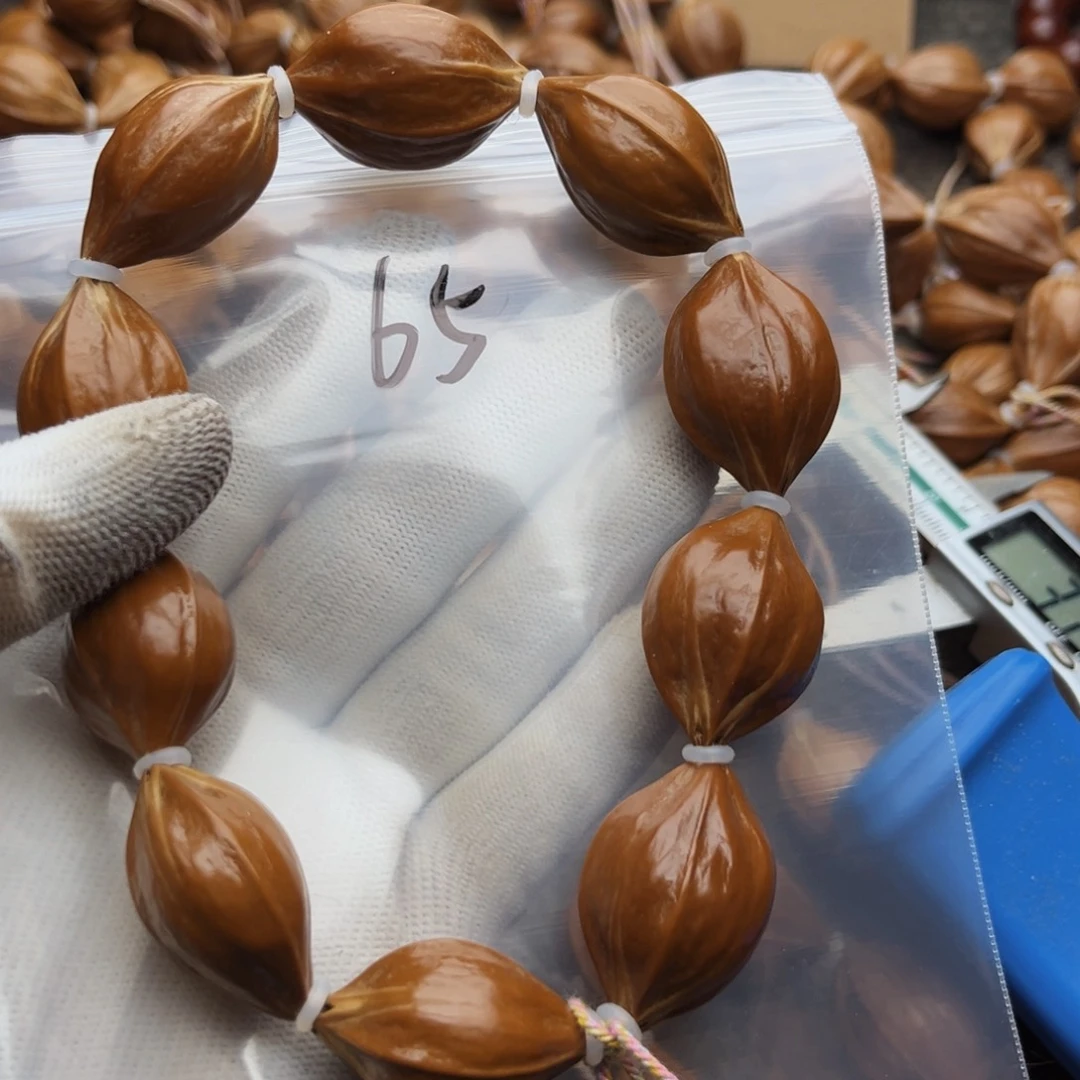 橄榄核手串/手链65号.2.2×3.1四花红款