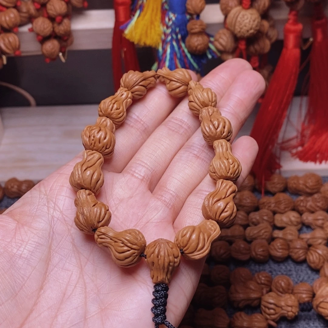 吊坠桃核桃枭手串