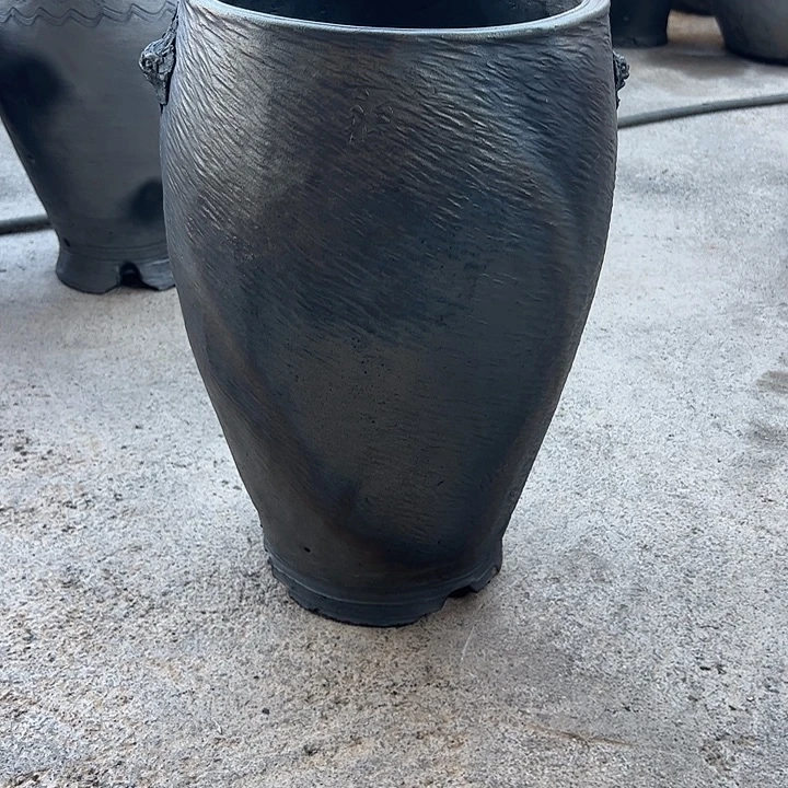 小***廉纯手工黑陶兰花盆