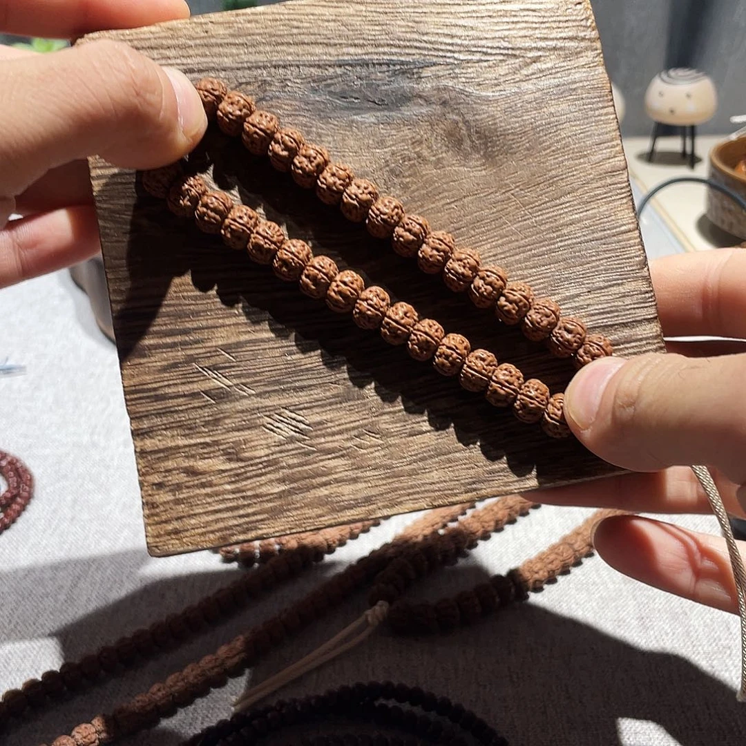 朙***曐金刚菩提吊坠老树王手持10全品