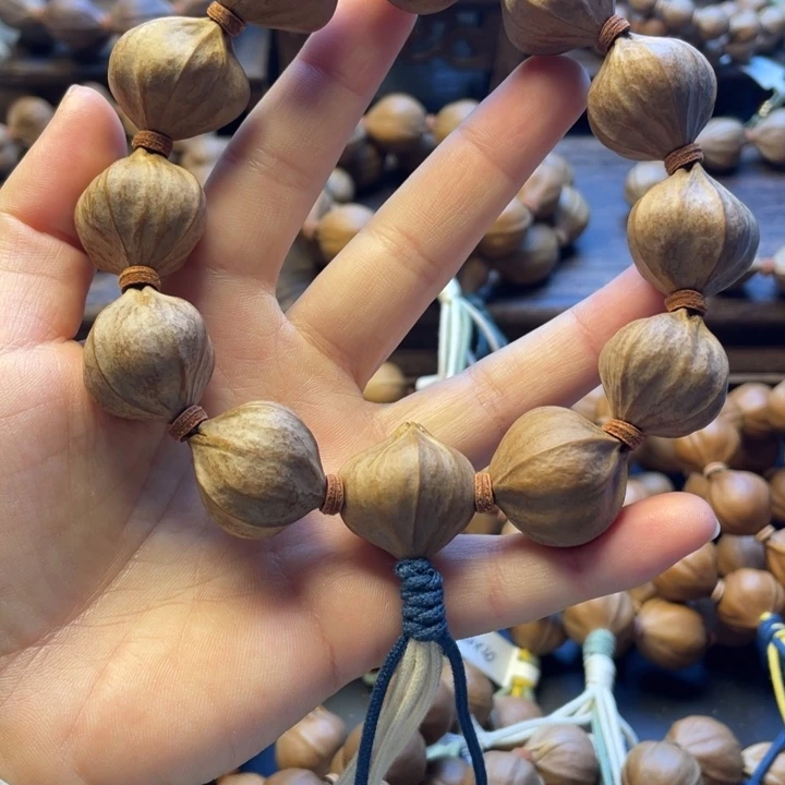 此***生橄榄核手串/手链广东铁四花24*25