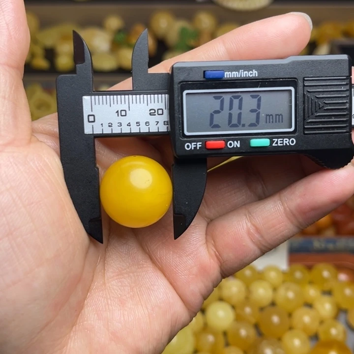 用***3蜜蜡未镶嵌珠宝奇石天然蜜蜡鸡油黄散珠