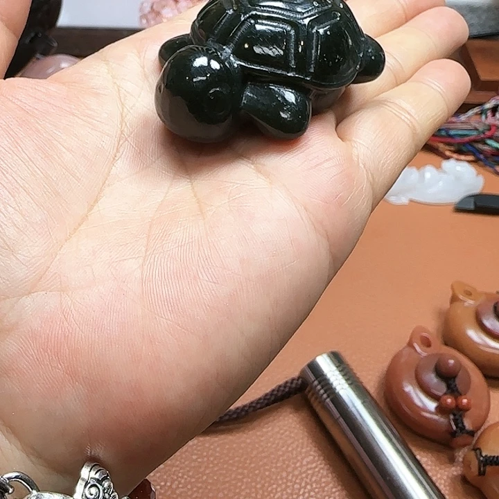 和田玉手把件未镶嵌