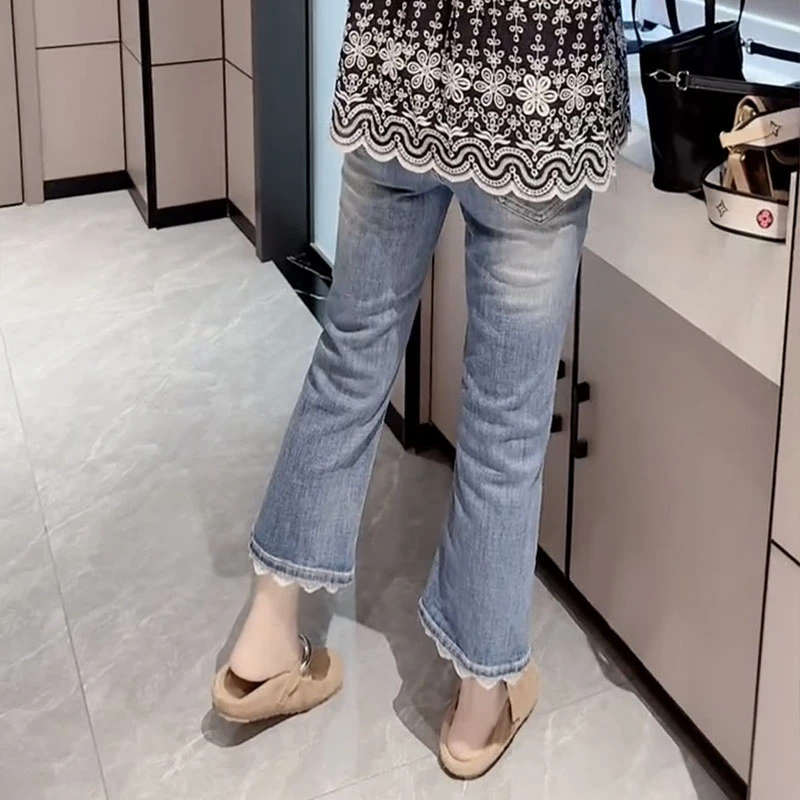 2025年夏季新款弹力牛仔裤大码蕾丝拼接九分微喇裤薄款显瘦喇叭裤